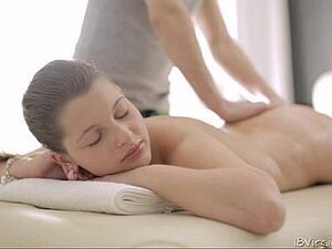 Sexy Nina lays boobs down on the massage