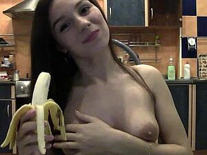 Naughty Brunette With A Banana on Webcam